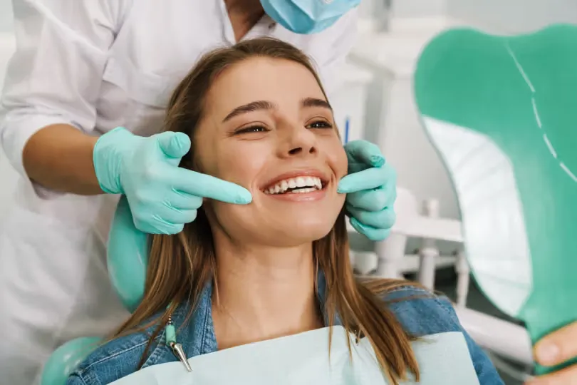 Patient smiling during a dental consultation
